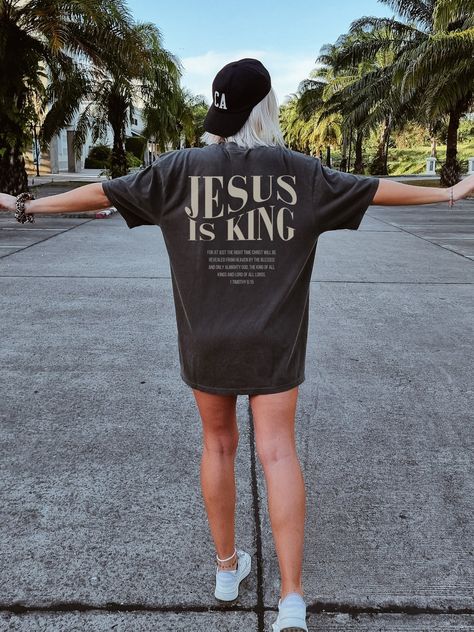 Jesus is king shirt, Jesus is king tshirt, Faith Based Shirts, Christian streetwear, Christian Merch, Jesus lover gift, Church Shirt, Bible Verse Shirt, Faith Based Apparel, Christian Apparel, Religious Apparel, trendy Christian 🐣 NOTE: Our female model wears a 2XL size shirt. Our shirts are unisex and true to size. For an oversized look, you need to order 1-2 sizes bigger than your normal size. We house several industrial printing technologies that allow us to apply ink directly into a textile Jesus Is King Shirt, Team Shirt Designs, Christian Clothes, Streetwear Tshirt Design, Christian Graphic Tees, Jesus Clothes, Christian Shirts Designs, Christian Merch, Christian Streetwear