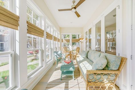 Large porch with windows turned into an elegant sunroom [Design: Echelon Interiors] Narrow Sunroom Ideas, Narrow Sunroom, Coastal Sunroom, Four Seasons Room Addition, Sunroom Renovation, Sunroom Remodel, Four Seasons Room, Sunroom Furniture, Sunroom Addition