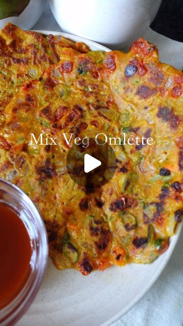 Shrilekha Patkar | Homechef💛 on Instagram: "Today’s Special ✨- Veggie-Infused Crispy Delight: Mix Vegetable Omelette! 🥒🍅🧅🌶️🍳
🥕

Try our Mix Vegetable Omelette:  A crispy omelette  bursting with colourful veggies! 🍳🥕 Let each bite take you on a flavourful journey, blending the richness of gram & rice flour with the freshness of veggies! 😋✨ Elevate your breakfast with this veggie-packed sensation – a feast for your taste buds! 🌟

Recipe in the comments section, Follow for more ♥️

#vegomlette #vegomletterecipe #vegetableomlette🍳 #crispyomelette #breakfastedition #healthybreakfastforkids #vegan #veganrecipes #veganfood #sizzlethespice" Veg Omelette Recipe, Vegetable Omelette Recipe, Crispy Omelette, Tomato Omelette Recipe, Veggie Omelette Recipe, Vegetable Omelette, Tomato Omelette, Mix Vegetable, Healthy Breakfast For Kids