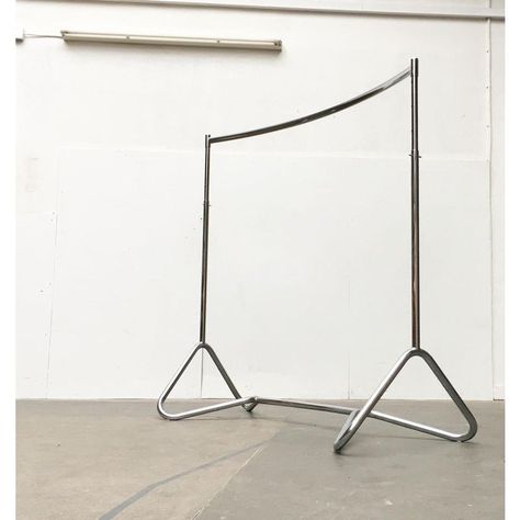 Rare mid century tubular steel coat rack by bremshey & co, solingen.  a timeless and functional design made of tubular steel. The whole stand is a slight arc. The lower rack consists of several elements, but looks like one continuous tube. The tube forms elegant loops towards the bottom. The actual clothes rail can be adjusted in height in 10 cm increments and fixed with a cotter pin. the wardrobe is in very good condition with traces of use.  dimensions: h: 124-164 cm, w: 150 cm, d: approx. 75. Mid Century Clothes Rack, Steel Tube Ideas, Vintage Clothing Rack, Metal Clothing Rack, Retail Clothing Racks, Clothing Rail, Creative Studio Space, Metal Coat Rack, Corner Rack