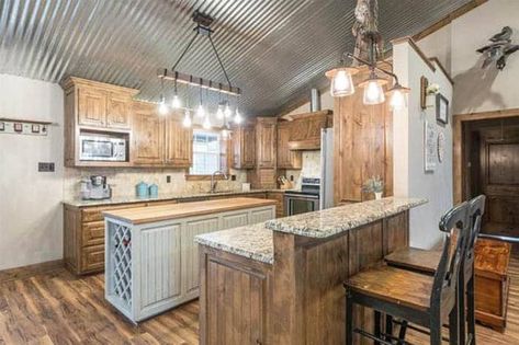 Kitchen with corrugated galvanized steel ceiling Galvanized Steel Ceiling, White Corrugated Metal Ceiling, Galvanized Ceiling Ideas, Tin Walls Rustic Kitchen, Barn Ceiling Ideas, Skoolie Ceiling, Galvanized Tin Ceiling, Galvanized Metal Ceiling, Tin Ceiling Kitchen