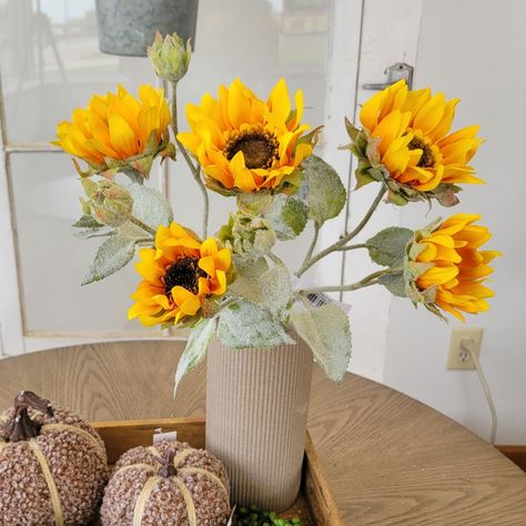 Use our Julie Sunflower Spray inside or outside! 🌻 This beautiful silk flower is stunning in a vase or striking in your porch pot for fall color 🍂 Find this wired stem in-store or online for your next project! 🔎 Julie Sunflower Spray #silkflowers #homedecorinspo #fauxflowers Silk Sunflower Arrangements, Sunflower Arrangements, Vase Display, Faux Floral Arrangement, Flameless Candles, Fragrance Gift, Lantern Candle Holders, Patriotic Decorations, Fall Floral