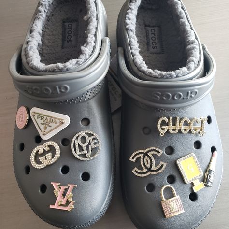 Gray Crocs With Jibbitz, Grey Crocs With Charms, Grey Crocs With Jibbitz, Black Crocs With Charms, Glow Up Shoes, Gray Crocs, Grey Crocs, Cool Crocs, Crocs With Jibbitz