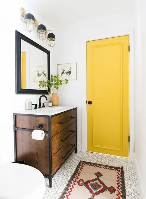 a small and bright bathroom with a yellow door for a touch of color and black fixtures to contrast it Small Space Bathroom, Yellow Door, Bright Bathroom, Old Bathroom, Bad Inspiration, Yellow Doors, Floor Remodel, Modern Farmhouse Bathroom, Yellow Bathrooms