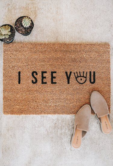 Make This Cute DIY Doormat This Weekend (Free Printable Included) | Hunker Painting Beadboard Paneling, Painting Pressed Wood, Ikea Mats, Hexagon Angles, Painted Beadboard, Diy Doormat, Door Mat Diy, Diy Techniques, Eye Print