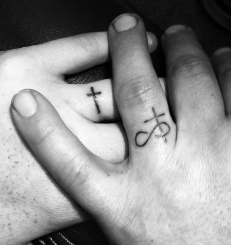 Wedding band tattoos. Christ first, us second! Wedding Band Tattoos, Nemesis Tattoo, Ring Tattoo Designs, Wedding Band Tattoo, Tattoo Band, See Tattoo, Cross Wedding, Ring Tattoo, Band Tattoos