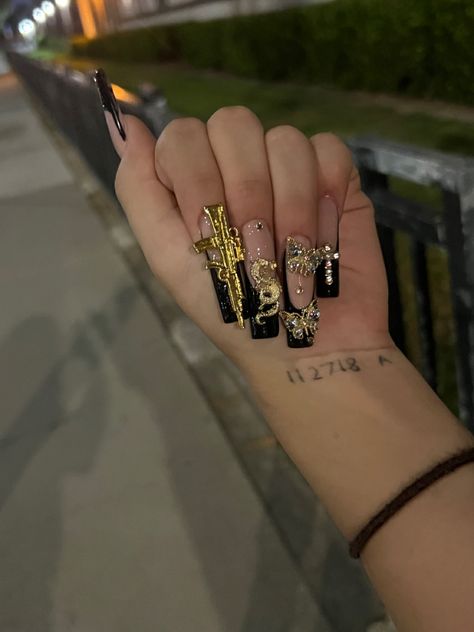 Black Nails With Gold Rhinestones, Black Long Nails Designs, Ak47 Nails, Black N Gold Nails, Money Nails Acrylic, Gold Long Nails, Black And Gold Nails Acrylic, Gangster Nails Designs, Gangsta Nails