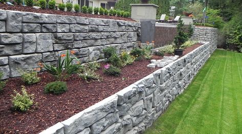 95 Stunning Retaining Wall Ideas - Backyard Boss Backyard Planting, Landscape Edging Stone, Natural Stone Retaining Wall, Backyard Retaining Walls, Dry Stack Stone, Building A Retaining Wall, Garden Retaining Wall, Garden Wall Designs, Landscape Lighting Design