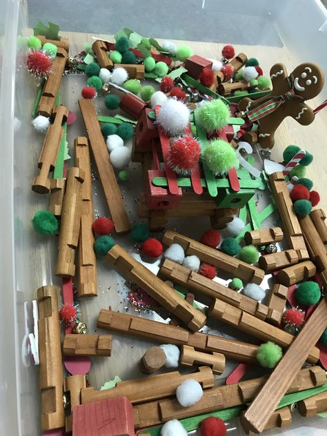 This sensory tub is perfect for preschool or young special needs children. It was created to accompany the story “The Gingerbread Baby” by Jan Brett. Add some holiday or winter colored popsicle sticks, Pom poms, blocks, sprinkles or colored rice, some foam “candies,” and some Lincoln logs to create a house for the gingerbread baby like Matti did in the story! Deck The Halls Preschool Activities, Christmas Home Living Center Preschool, Gingerbread Block Center Preschool, Gingerbread Block Center, Gingerbread House Sensory Bin, Gingerbread Sensory Preschool, Christmas Dramatic Play Toddlers, Prek Christmas Sensory Bin, Christmas Pretend Play Preschool