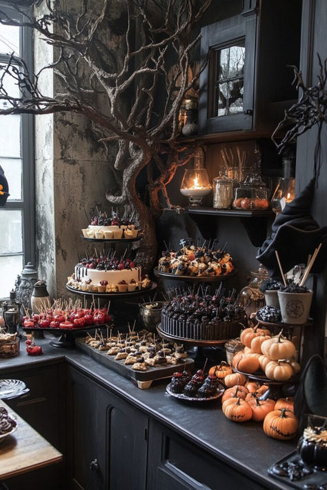 Set up a Spooky Treats Station in your kitchen with ghost cupcakes and witch finger cookies. Add striped tablecloths and faux spider webs to make this Halloween decor kitchen a deliciously spooky setup. Tap here for more spooky treat station ideas. Halloween Atheistic, Witch Party Food, Halloween Food Display, Halloween Birthday Party For Adults, Halloween Buffet Food, Halloween Branches, Halloween Table Scape, Goth Food, Halloween Buffet Table