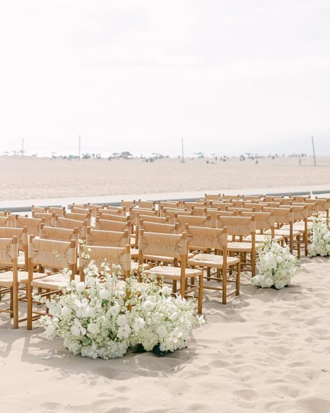 There’s nothing better than a wedding on the beach!🤍🌊 Design & Coordination: @alwaysallegra_ Venue: @jonathanclub Photography: @ashleyburnsphotography Floral Design & Artistry: @epausini Bride & Groom: @jackiebmcp & @scott__mcpherson #beachwedding #weddinginspo #beachweddingdecor #beachweddingideas #eventrentals #weddingrentals #rentals #foundrentals Floral Arch Beach Wedding, Beach Front Wedding Decor, Beach Wedding Cocktail Hour Decor, Beach Flower Wedding, Beach Gazebo Wedding, Beach Wedding Chairs, Outdoor Beach Wedding Reception, Neutral Beach Wedding, Beach Wedding Florals