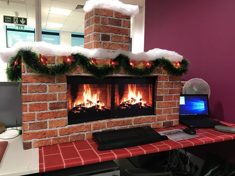 this is a cardboard fireplace I made for my desk at work. Cubicle Christmas Decor Ideas, Office Desk Christmas Decor For Work, Desk Christmas Decorations Work, Christmas Office Desk, Christmas Desk Decorations, Desk Fireplace, Cubicle Decorations, Christmas Cubicle Decorations, Christmas Desk