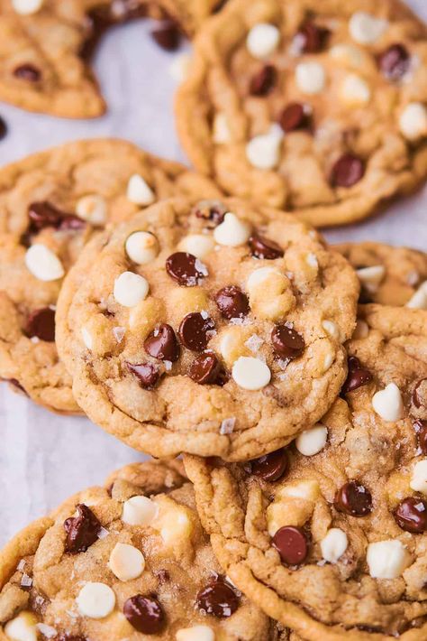 These Chocolate Chip and White Chocolate Chip Cookies are like two cookies in one! These delicious cookies are an elevated version of classic chocolate chip cookies, bursting with both semi-sweet chocolate chips and white chocolate chips. These chewy cookies have nice crispy edges, and they will definitely satisfy your sweet tooth. White Chocolate And Chocolate Cookies, Chocolate Chip And White Chip Cookies, Chocolate Chip Cookies With White Chips, Milk And White Chocolate Chip Cookies, Black And White Chocolate Chip Cookies, Recipes Using Semi Sweet Chocolate Chips, Chocolate And White Chip Cookies, Cookie With White Chocolate Chips, White And Chocolate Chip Cookies