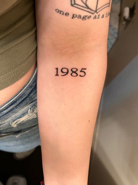 year 1985 in a classic, times new roman kind of font Times New Roman Font Tattoo Numbers, 1984 Tattoo Number Fonts, 1985 Tattoo Ideas, Year Number Tattoo, 1984 Tattoo Ideas, Times New Roman Font Tattoo, 1985 Tattoo, Year Tattoo Number, Number Tattoo Fonts