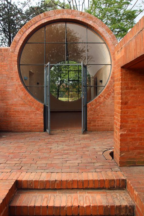 Art Moderne Architecture, 1970 Architecture, Modern Arches, Weird Architecture, Whimsical Architecture, Circular Buildings, Brick Arch, Brick Art, Brick Architecture