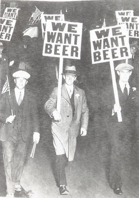 in this photograph, people were protesting the prohibition in America. Obviously the protesting was not effective so the citizens all across america took matters into their own hands but selling and buying illegally. 1920 Bar, Prohibition Bar, Prohibition Party, Speakeasy Party, Roaring 20s Party, 1920s Party, Nye Party, Gatsby Party, Roaring 20s