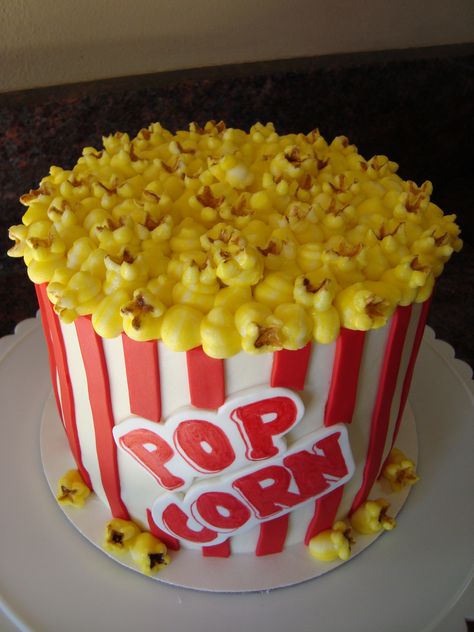 popcorn bucket - This was for my daughter's 9th birthday.  it is all buttercream except for the red stripes and the word POPCORN.  the popcorn itself is also buttercream. i used a 12 and i think a 5 tip and then painted the inside brown.  much easier than i thought and i think it looks more realistic than the mini marshmellow method. Popcorn Cake, Specialty Cake, Corn Cakes, Popcorn Bucket, Crazy Cakes, Specialty Cakes, Unique Cakes, Novelty Cakes, Occasion Cakes