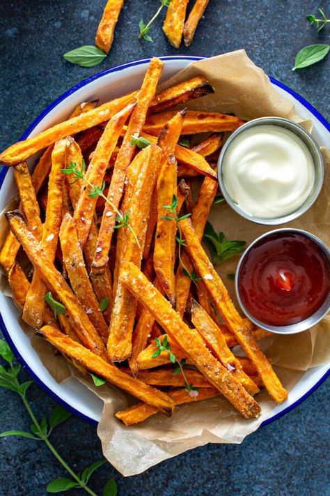 Super crispy and perfectly seasoned Baked Sweet Potato Fries are only four ingredients away! You can even prep them ahead, making for an easy snack or side dish. #SweetPotatoFries #SweetPotatoFriesRecipe #BakedSweetPotatoFries #BakedFries #SweetPotatoRecipes #SweetPotatoes #SideDish #SideDishRecipes Fries Recipe Homemade, Truffle Mayo, Homemade Sweet Potato Fries, Potato Fries Baked, Air Fryer Sweet Potato Fries, Paneer Sandwich, Kohlrabi Recipes, Crispy Sweet Potato Fries, Food Hamburger