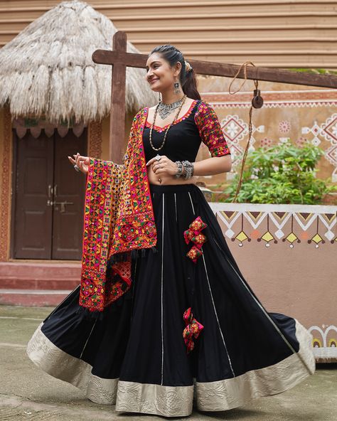 Celebrate Navratri style Rich black color with embroidery & mirror work and viscose rayon dupatta 🖤✨ SHOP NOW 🛍️ gotifab.com [lehengacholi, garba outfits, navratri lehengas, navratri collection,navratri chaniya choli,navratri collection ] #lehengacholi #navratrilehenga #navratricollection #navratri #navratrichaniyacholi #garbaoutfit Garba Outfit, Navratri Lehenga, Chaniya Choli Designs, Lehenga Bridesmaid, Mirror Work Lehenga, Black Lehenga, Mirror Work Blouse, Navratri Chaniya Choli, Bridesmaid Saree