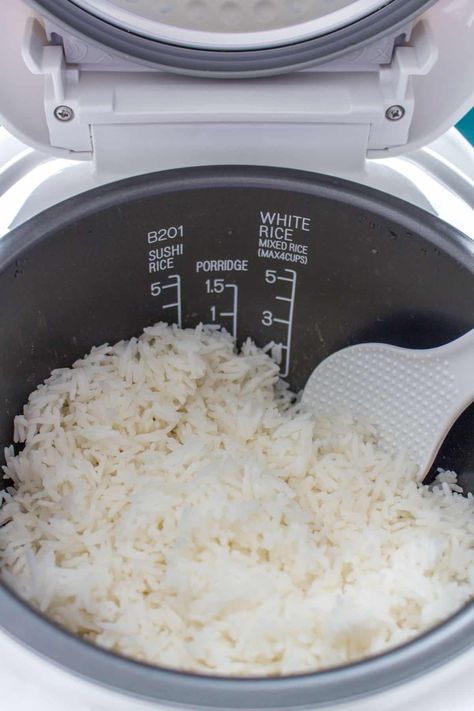 Want to cook the fluffiest tender jasmine rice? Here's a guide on How to Cook Jasmine Rice on the stove top, in an Instant Pot, or a rice cooker. How To Cook Jasmine Rice In Rice Cooker, Rice Cooker Jasmine Rice, Jasmine Rice Recipes Rice Cooker, Jasmine Rice In Rice Cooker, Jasmine Rice Rice Cooker, Cook Jasmine Rice, Tiger Rice Cooker, Rice In Rice Cooker, Cuckoo Rice Cooker