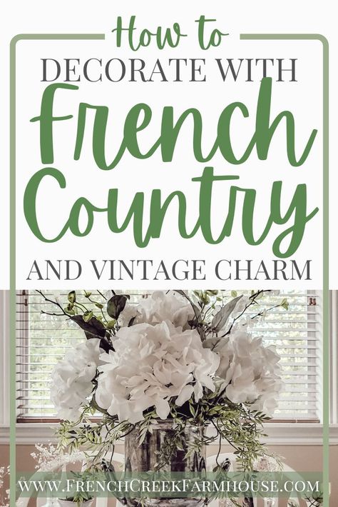 Come along on our spring home tour here at the farm! On our dining table, I created a vintage French Country themed centerpiece for our tablescape. This was my first attempt at large scale floral arranging, but I love how it turned out, and I’ll definitely be trying it again soon. I hope this post gives you lots of ideas for decorating your own home and creating a vintage farmhouse tablescape. | French Creek Farmhouse French Farmhouse Table Decor, French Country Table Centerpiece, Dining Table Decor Ideas Centerpieces, French Country Centerpieces Dining Rooms, French Country Dining Table Centerpiece, Spring Tablescapes Ideas French Country, French Country Color Palette Kitchen, French Country Vignettes, French Country Spring Decor