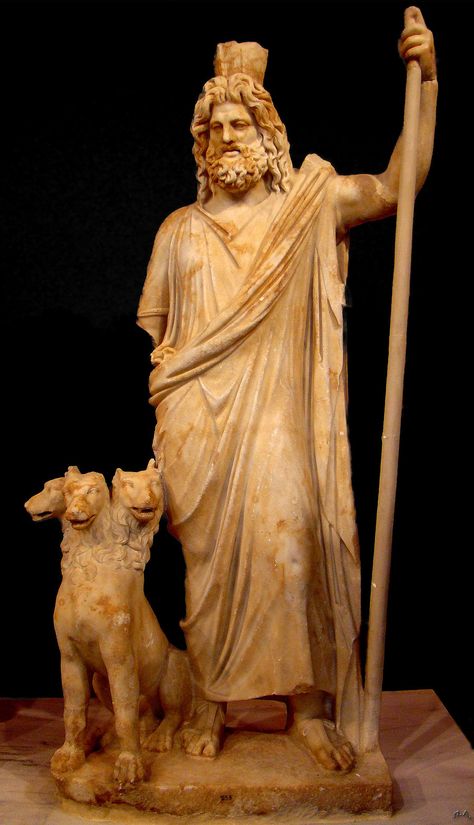 An ancient statue of Hades alongside Cerberus, the hound and guard of the Underworld gates The Underworld, Underworld, Deviantart, Statue, Dogs