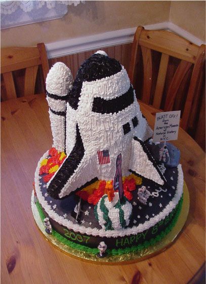 - 3-D space shuttle for party at Museum of Natural History.  Cake is entirely edible(cake and rice krispy treats)  except for the figures. 3d Rocket Cake, Space Party Crafts, History Cake, Spaceship Cake, Nasa Party, Space Cakes, Jake Cake, Rocket Cake, 4de Verjaardag