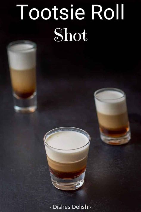 Its dense, double-chocolate flavor earned the tootsie roll shot the same name as the candy. Taste for yourself!  There are only three ingredients to this scrumptious shot! #tootsierollshot #layeredshot #dishesdelish Tootsie Roll Shot, Alcohol Shots, Camping Drinks, Cocktail Food, Alcohol Beverages, Liquor Recipes, Liquor Shots, Mimosa Recipe, Cocktail Shots