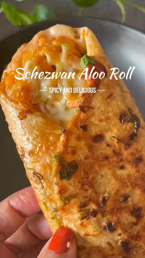 Craving something spicy and delicious? Try this Schezwan Roti Roll—a perfect fusion of Indian and Chinese flavors! Packed with stir-fried veggies, Schezwan sauce, and wrapped in a soft roti, this roll is the ideal snack or lunch option. Quick, easy, and bursting with bold flavors, this is a must-try for all spice lovers!  #SchezwanRotiRoll #IndoChinese #SpicySnacks #EasyRolls #StreetFoodAtHome #QuickRecipes #FusionFlavors #VegetarianDelight Healthy Food Cravings, Easy Street Food Ideas, Spicy Easy Recipes, Roti Wrap Recipe, Easy Indian Vegetable Recipes, Easy Spicy Snacks To Make, Indian Healthy Lunch Ideas, Spicy Snacks Recipes Easy, Roti Roll Recipe