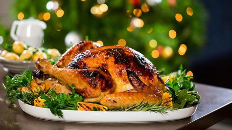 Adam Liaw’s orange-glazed #turkey with Scarborough Fair stuffing is the perfect centrepiece for your Christmas feast. Watch Destination Flavour Christmas December 11, 8:30pm on SBS ONE. Easy Thanksgiving Turkey, Moist Turkey, Herb Roasted Turkey, Debi Mazar, Seasoned Butter, Roast Turkey Recipes, Whole Turkey, Turkey Recipes Thanksgiving, Turkey Gravy