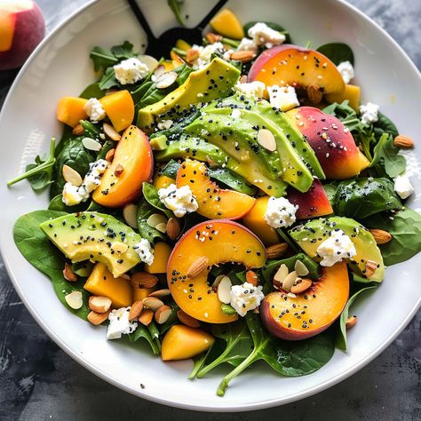 Refreshing Summer Peach Spinach Salad with avocado, toasted almonds, and goat cheese. Perfect for a healthy summer meal. Peach And Avocado Salad, Salad With Avocado, Goat Cheese Recipes, Fresh Salad Recipes, Summer Meal, Fresh Salad, Healthy Summer Recipes, Easy Salad Recipes, Summer Refreshments