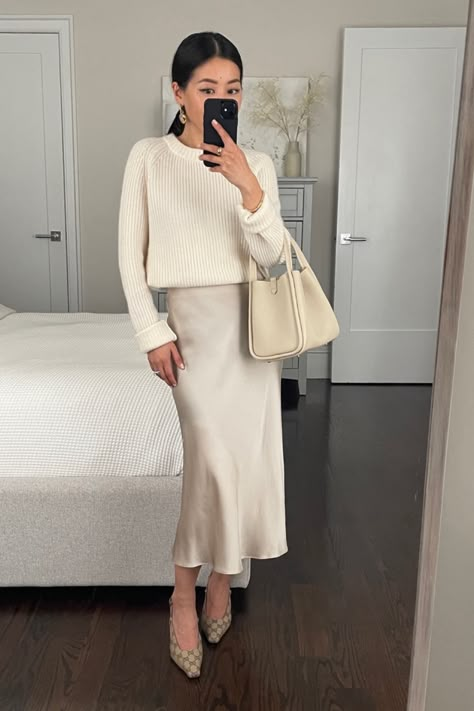 Quince sweater Quince slip skirt songmont bag gucci shoes Champagne Skirt Outfit Winter, White Silk Skirt Outfit Winter, Satin Skirt Outfit For Work, Beige Satin Skirt Outfit Winter, Ecru Skirt Outfit, Slip Skirt With Sweater, Creme Satin Skirt Outfit, Champagne Slip Skirt Outfit, Slip Skirt And Sweater Outfit