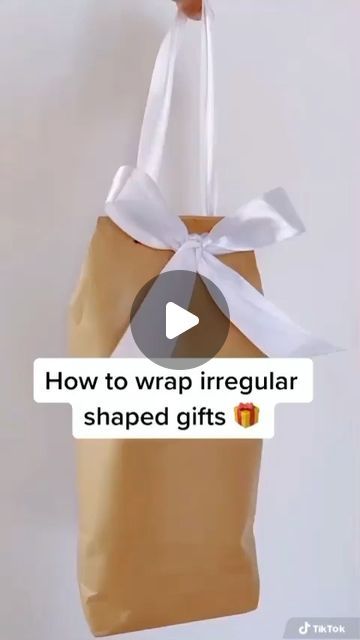 Swan Brand on Instagram: "How to wrap irregular shaped gifts 🎁   📷@mama_mila_au" How To Wrap Weird Shaped Presents, Wrapping Irregular Gifts, Wrapping Odd Shaped Gifts, Weird Shapes, Gift Packs, Gift Bags, Envelope, Christmas Gifts, Gift Wrapping