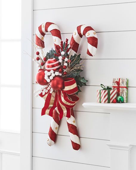 CHRISTMAS DECOR Get a jump start on the season! Find stunning Christmas decor, from faux florals and garlands to gorgeous topiaries, ornaments and gingerbread houses. We'll be hand-selecting a bright and fun selection of Christmas stockings, pillow covers, bedding Santa's and Angels. Check back and browse through a gorgeous collection of Christmas home decor. Bright Christmas Decorations, Candy Cane Candy, Christmas Candy Cane Decorations, Candy Cane Crafts, Candy Cane Decorations, Candy Christmas Decorations, Christmas Door Decorations, Candy Land Christmas, Christmas Candy Cane