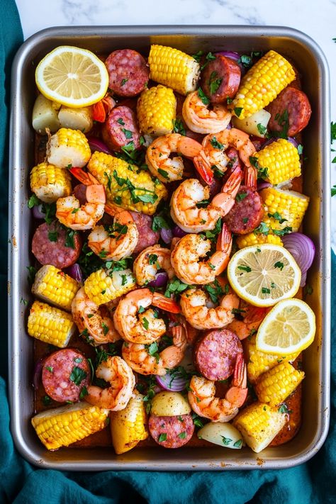 Indulge in the delicious flavors of a classic shrimp boil with this easy-to-follow recipe. Packed with tender shrimp, sweet corn, hearty potatoes, and zesty sausage, this one-pot meal is perfect for gatherings or weeknight dinners. The combination of Old Bay seasoning and Cajun spices creates a mouthwatering blend that will have everyone coming back for seconds. Seafood Boil Potatoes, Shrimp And Corn Pasta, Kielbasa And Shrimp Recipes, Oven Shrimp Boil, Shrimp Boil Recipes, Colossal Shrimp Recipe, Shrimp Sausage Corn Potatoes, Shrimp And Sausage Recipes, Shrimp Boil Foil Packets