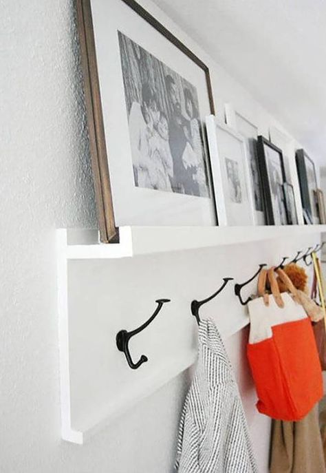 Hang your coats AND display your fave photos with this coat rack shelf. Build Your Own Wardrobe, Wall Mounted Wood Shelves, Entryway Coat Hooks, Shelf Entryway, Rustic Coat Rack, Entryway Organizer, Coat Rack Shelf, Picture Ledge, Entryway Organization