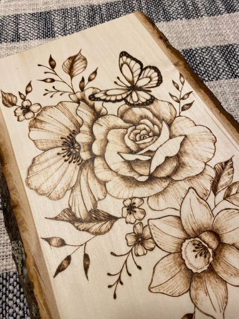 Hand burned butterfly and flowers on a wood plank. Pyrography Flower Patterns, Wood Burned Flowers, Wood Burning Flowers, Flower Wood Burning, Butterfly Pics, Burning Flowers, Woodburning Art, Wood Burning Patterns Stencil, Wood Christmas Decorations