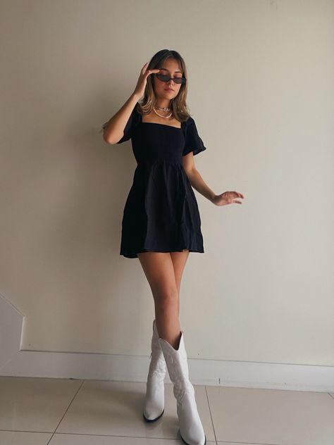 Cowboy boots 90s little black dress inpo Black Dresses Western, Outfits White Cowboy Boots, Black Dress And White Boots, Fancy Cowboy Boots Outfit, Cowboy Boots With A Dress, Cowgirl Boots And Dress Outfit Wedding, Dress And Country Boots Outfit, Cute Dress With Cowboy Boots, Black Dress With White Cowboy Boots