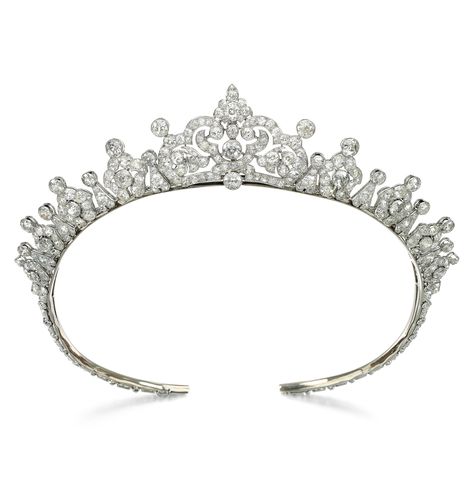 Cartier | A fine Art Deco diamond necklace/tiara, 1930s. The central, detachable, openwork panel, between a graduated series of palmette and arrow-head motifs, set throughout with circular-cut and cushion-shaped diamonds, length approximately 430mm, signed Cartier, accompanied by a tiara fitting, screwdriver and brooch fitting, inner circumference of tiara approximately 450mm (expandable), central element may be worn as a brooch. Cartier Tiara, Tiara Necklace, Cartier Diamond, Cartier Necklace, Diamond Tiara, International Jewelry, Harry Winston, Necklace Clasps, Unusual Jewelry