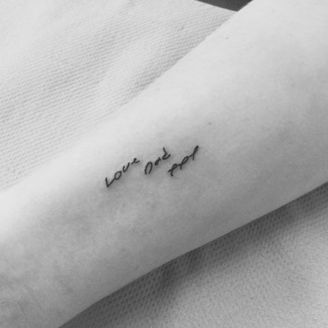 Beautiful piece of script, done using client's late-father's handwriting Text tattoo. Commemorative. Love. Dad. Done by me - Cherry Sundae at Oxford Ink Minimalist Father Daughter Tattoo, Fathers Name Tattoo, Love Mom And Dad Tattoo, Like Father Like Daughter Tattoo, Tattoo Ideas For Dads With Daughters, Tattoos Dedicated To Dad, Dad Handwriting Tattoo, Parents Handwriting Tattoo, Dad Tattoos For Daughter