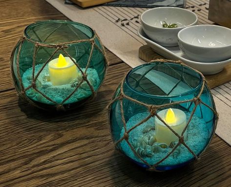 Glass Float dia 5". LED tealight not included, sand and shells inclued in packing. Teal and blue set of 2 pack. Perfect decoration for your coastal farmhouse and beach room. Ocean Inspired Centerpieces, Under The Sea Balloon Centerpieces, House Boat Decor, Coastal Decorative Pillows, Nautical Table Decor, Ocean Restaurant, Nautical Bar, Ocean Bathroom, Beachy Bathroom