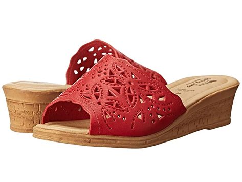 Spring Step Estella (Red) Women's Wedge Shoes If you're looking for outstanding bliss to last you all day long the Estella slide wedge from Spring Step is the right choice for you! Soft leather upper with intricate laser-cut design for added style and a feminine appeal. Slip-on silhouette with leather lining that conforms to the foot for an easy secure fit. Cushioned footbed with arch pillow provides support and comfort with each step. Synthetic cor #SpringStep #Shoes #OpenFootwear #Wedge #Red Strappy Sandals Flat, Strappy Flats, Slingback Flats, Shoes Store, Wedges Style, Studded Heels, Dress Shoes Womens, Womens Wedges, Womens Shoes Wedges