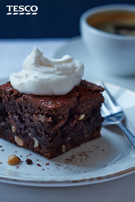 This chocolate brownie recipe is made all the more decadent through coffee liqueur, vodka and hazelnuts - a gorgeous baking recipe inspired by the White Russian cocktail. | Tesco Desserts For Adults, Chocolate Fridge, Chocolate Fridge Cake, Broken Biscuits, Cake No Bake, Fridge Cake, Xmas Recipes, Tesco Real Food, Dessert Recipies