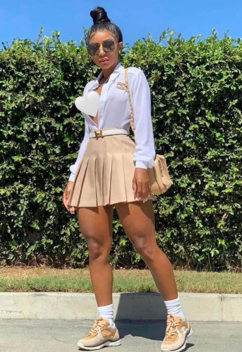 Mini Skirt Outfit With Sneakers, Brown Pleated Mini Skirt Outfit, Shein Brunch Outfit Ideas Black Women, Girly Outfits With Sneakers, Tan Skirt Outfit Black Women, Skater Skirt Outfit Black Women, How To Style Plaid Skirt Outfit, Skort Outfit Baddie, Birthday Brunch Outfit Ideas