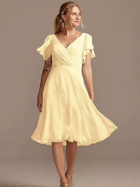 mid-length yellow gown with a ruffled hem. Pastel Green Dress, Peach Midi Dress, Pastel Bridesmaids, High Low Cocktail Dress, Short Bridesmaid Dress, Pastel Bridesmaid Dresses, Wrap Dress Bridesmaid, Green Wedding Dresses, Midi Bridesmaid Dress