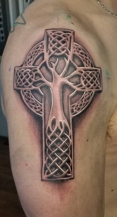 << Check out more Celtic Cross Tattoos, Ideas and Meanings #tattoomenow #tattooideas #tattoodesigns #tattoos #Celtic #Cross #Celticcross Celtic Shoulder Tattoo Men, Celtic Tattoos Sleeve, Celtic Cross Tattoo Feminine, Irish Cross Tattoo, Celtic Cross Tattoo For Men, Cross Tattoos For Men, Celtic Cross Tattoo, Celtic Tattoo For Women, Norse Tattoos