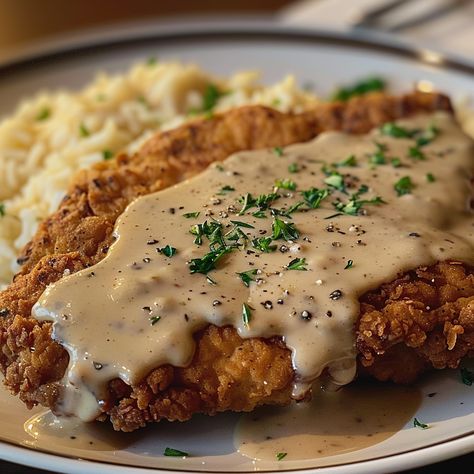 Classic Chicken Fried Steak with Country Gravy is a comforting Southern dish that brings warmth and flavor to any table. Country Dinner Recipes, Quick Gravy Recipe, Pappadeaux Alexander Sauce Recipe, Country Dinners, Chicken Fried Steak Easy, Country Gravy Recipe, Beef Cubed Steak, Breaded Steak, Chicken Gravy Recipe