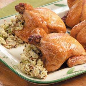 Tender Stuffed Cornish Hens Recipe Cornish Hen Recipes Oven, Stuffed Cornish Hens, Rice Stuffing Recipes, Game Hen Recipes, Wild Rice Stuffing, Cornish Game Hen Recipes, Cornish Hen Recipe, Cornish Hen, Rice Stuffing