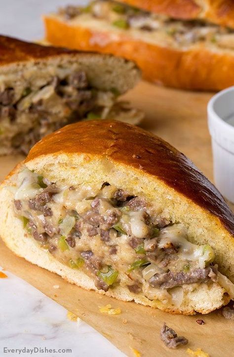 Steak and cheese stuffed French bread recipe Philly Cheese Steak French Loaf, Stuffed Bread Recipes Meat, French Bread Subs, French Bread Stromboli, French Bread And Hamburger Meat, Stuff French Bread, French Bread Philly Cheese Steak, French Loaf Recipe Ideas, Filled Bread Recipes