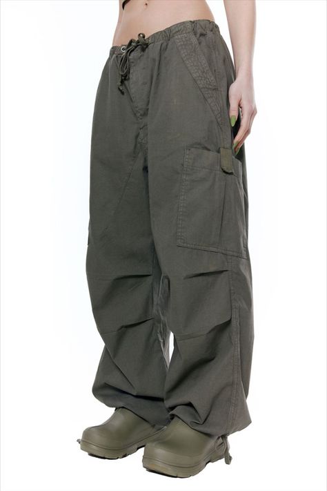 khaki parachute cargo pants 
oversized fit
six-pocket styling
elasticated waistband with adjustable cotton drawcord through metal eyelets 
metal zip fly front with bar tack detail & concealed button closure 
pleated knee
adjustable cotton drawcord at cuff
inside leg darts 
inside leg measures 73cm 
size s = uk 8-10
model is 5 ft 8 and wears a size s Khaki Parachute Pants Outfit, Green Cargo Pants Outfit Fall, Green Parachute Pants Outfit, Jaded London Parachute Pants, Cargo Pants Outfit Fall, Green Parachute Pants, Green Cargo Pants Outfit, Green Cargos, Cargo Parachute Pants